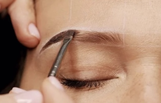 Stock image showing freshly tinted and shaped brows using hybrid dye and waxing 