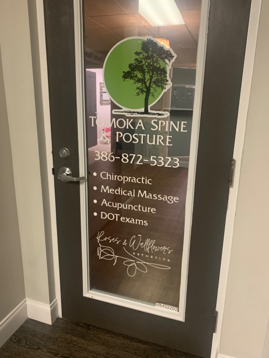 Entrance to Tomoka Spine & Posture, the professional location of Roses & Wallflowers Esthetics 